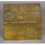 A 19th century gilt metal tobacco box The hinged cover cast with a steeplechaser enclosing a