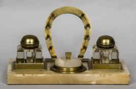 A Victorian brass mounted onyx desk stand The pen rest formed as a horseshoe,