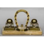 A Victorian brass mounted onyx desk stand The pen rest formed as a horseshoe,