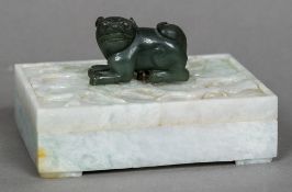 A Chinese carved jade box Of hinged rectangular form,