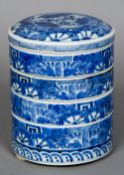 A set of Oriental blue and white porcelain stacking dishes Each of cylindrical form,