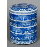 A set of Oriental blue and white porcelain stacking dishes Each of cylindrical form,