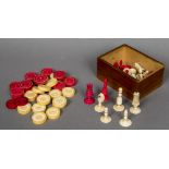 A late 18th century ivory and stained ivory Washington type chess set Together with a set of thirty