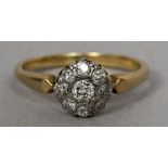 A diamond set gold cluster ring CONDITION REPORTS: Generally in good condition,