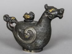 A Chinese white and gilt metal vessel Modelled as a duck riding a horse,