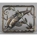 A Georg Jensen silver brooch Worked with a pair of dolphins,