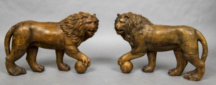 A pair of 18th/19th century carved pine lions Modelled after the Medici lions,