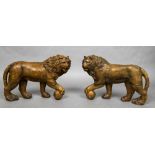 A pair of 18th/19th century carved pine lions Modelled after the Medici lions,