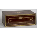 A Regency brass bound mahogany writing slope Of typical hinged form with brass inlaid decoration,