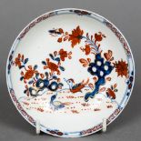 A Lowestoft porcelain saucer dish Decorated with birds amongst foliage in the Imari palette.