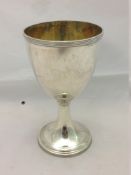 A George III silver goblet, hallmarked London 1792, maker's mark of William Simmons Of plain form,