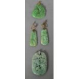 A pair of 14 ct gold mounted carved jade pendant earrings Together with an 18 ct gold mounted