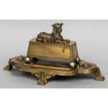 A late 19th century Egyptian Revival bronze desk stand The lobed main body mounted with a casket