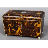 A 19th century tortoiseshell tea caddy The domed hinged rectangular top including two lidded