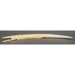 A large early 20th century African carved ivory crocodile Typically worked. 71.5 cm long.
