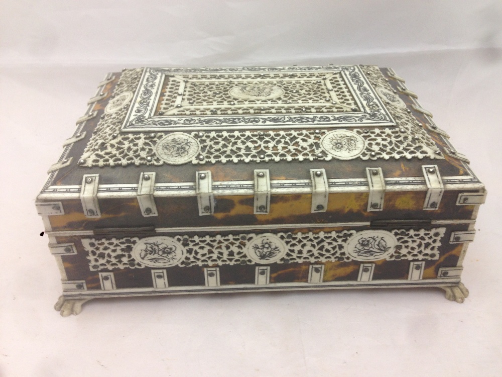 A 19th century Anglo-Indian bone mounted tortoiseshell casket The mounted panels intricately worked - Image 4 of 8