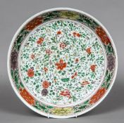 A Chinese porcelain dished charger Decorated with lotus strapwork. 35 cm diameter.