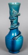 A Chinese porcelain dragon vase With allover turquoise glaze. 23.5 cm high.