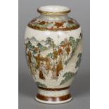 A late 19th century Japanese satsuma vase Decorated in the round with a figural procession,