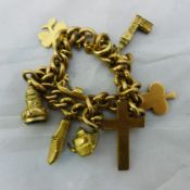 A 9 ct gold charm bracelet and charms,