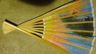 A large hand painted fan and various tins