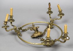 A late 19th/early 20th century gilt bronze hanging chandelier Of circular three sectional scrolling