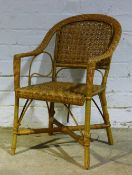 An early 20th century cane child's chair