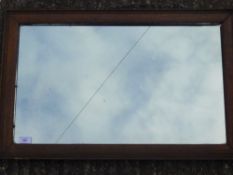 An oak framed mirror