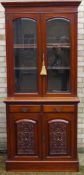 A Victorian walnut bookcase/cabinet