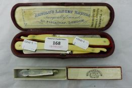 A pair of cased cut throat razors and a silver bladed mother-of-pearl handle fruit knife