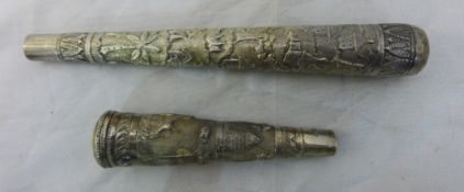 Two Eastern silver cane handles