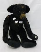 A black teddy bear,