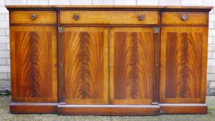 A brass inlaid sideboard