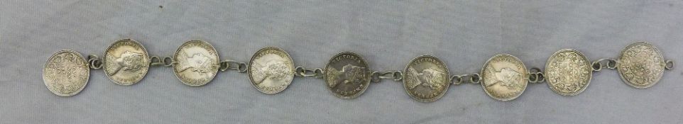 A silver bracelet made of two Annas coins