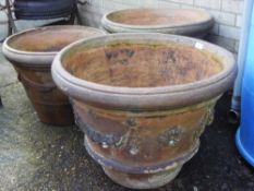 Three large terracotta garden pots