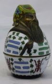 A cloisonne lidded figural box