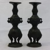 A pair of Oriental bronze vases