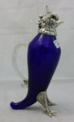 A blue glass bird claret jug