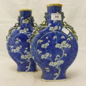A pair of 19th century Chinese moon flasks