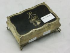 An unmarked silver and tortoiseshell jewellery box