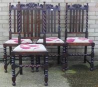 A set of four early 20th century oak barley twist dining chairs