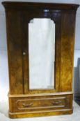 A Victorian mirrored single door burr walnut wardrobe