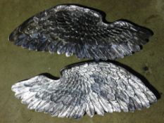 A pair of silvered angel wings