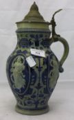 A 19th century stein, decorated with the four seasons,