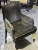 A 19th century upholstered child's armchair