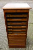 An early 20th century oak tambour fronted filing cabinet