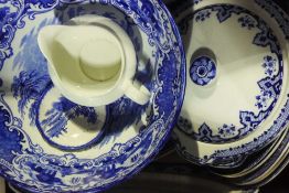 A quantity of blue and white dinner ware