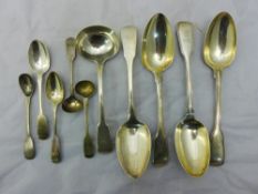 A quantity of silver spoons and a ladle