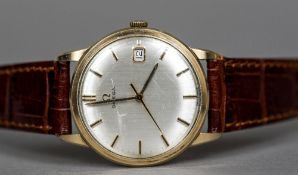 A 9 ct gold cased Omega gentleman's wristwatch The signed silvered dial with gilt baton markers and