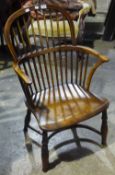 A 19th century yewwood and elm Windsor chair